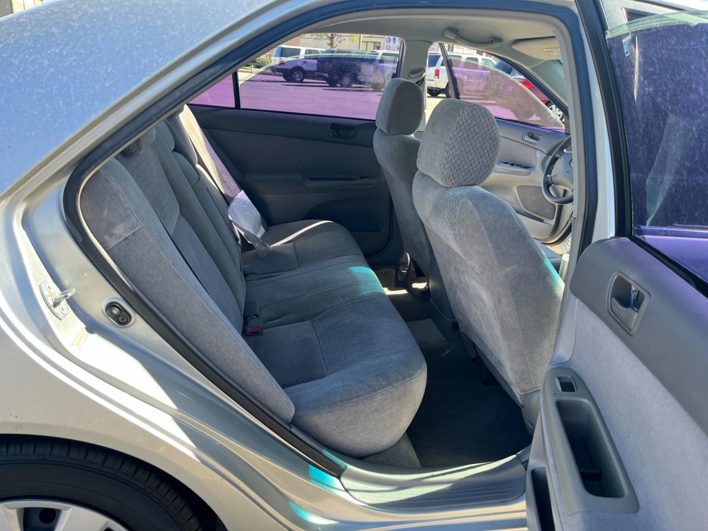 2002 SILVER /gray Toyota Camry LE (4T1BE32K72U) with an 2.4L L4 DOHC 16V engine, Automatic transmission, located at 14700 Tomball Parkway 249, Houston, TX, 77086, (281) 444-2200, 29.928619, -95.504074 - Photo#12